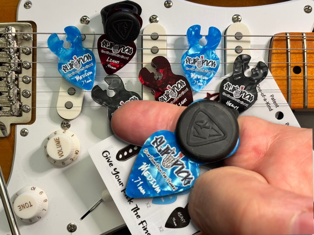 Next Generation Flip Pick System Starter Pack by PFV Innovations LLC with flip picks and accessories on a white background.